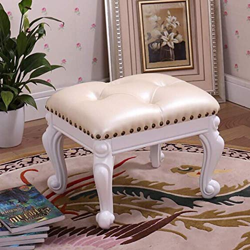 Repose-pieds ottoman vintage rembourré pour coin lecture cosy