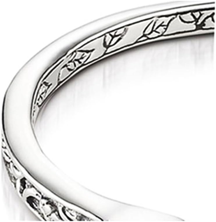 Sterling Silver This beautifully engraved sterling silver morganite bangle bracelet will become a staple in your jewelry box