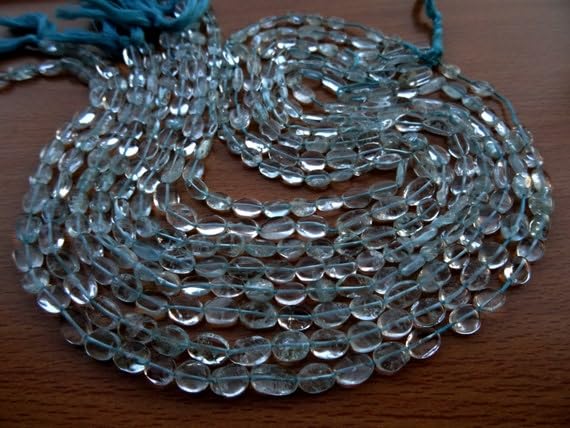 Fil aigue-marine naturelle perles ovales douces pour bijoux élégants au quotidien
