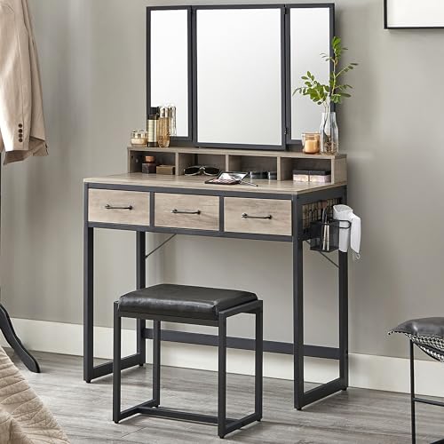 VASAGLE Dressing table with 3-piece folding mirror, hair dryer holder, cosmetic table with padded stool, 3 drawers, industrial design, greige and black, RVT004B02
