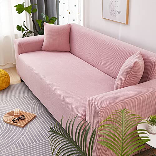 Housse de canapé extensible rose pour rénover un fauteuil