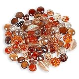 This mixture contains Harvest Color Glass Marbles with Acrylic Pumpkins, Leaves and Acorns. 32 Ounces Total - Approx 200 glass marbles and 36 acrylic embellishing pieces Use for Autumn Table Scatters, To Fill Fall Vases, in your Thanksgiving Crafts a...