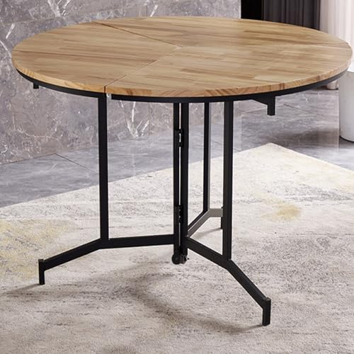 Table à manger ronde pliable pour optimiser l'espace d'un salon étroit