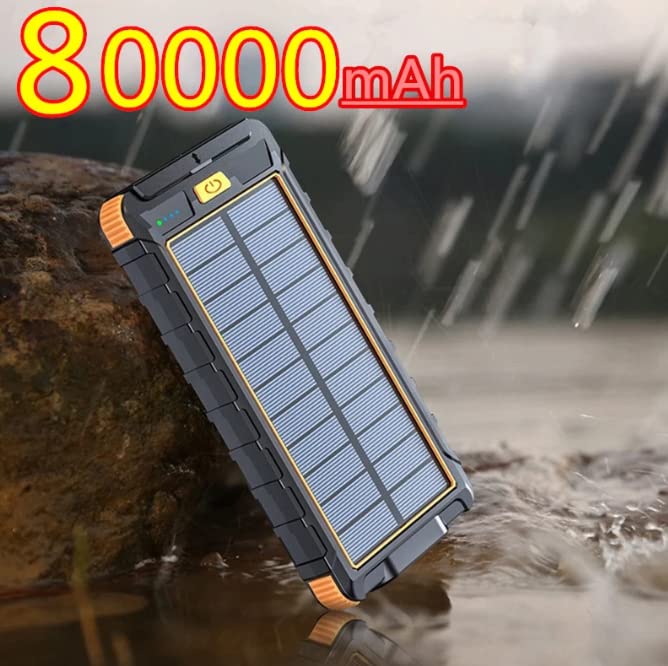 Batería externa impermeable de 80000 mAh con células solares, linterna y brújula, color naranja