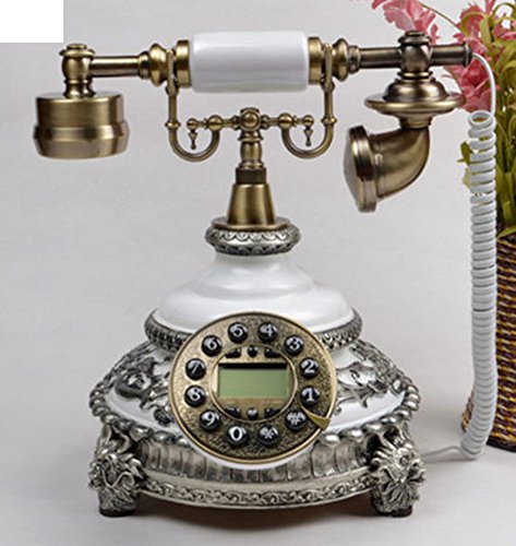 Téléphone fixe ancien blanc de bureau filaire rétro au design rétro vintage pour maison