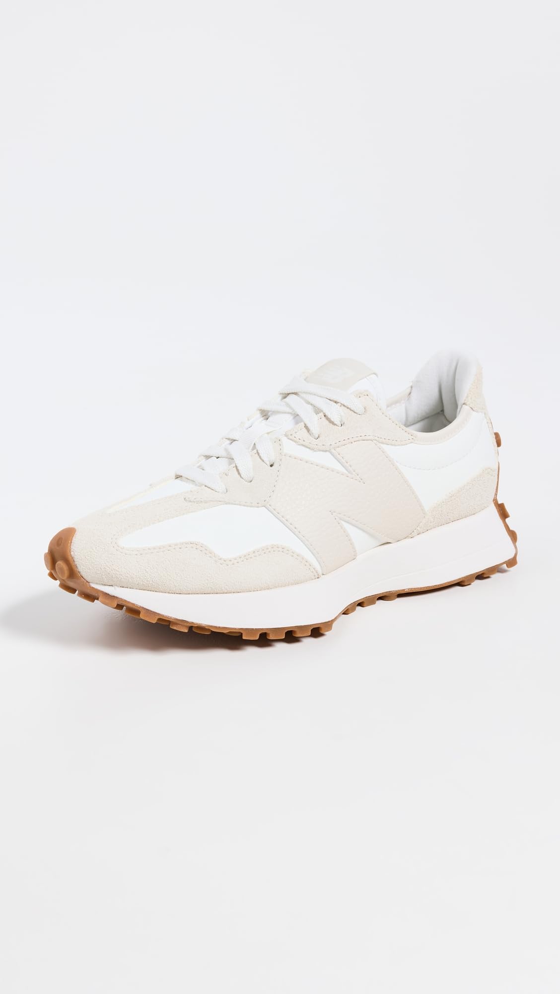 Close-up view of the New Balance Women's 327 sneaker showcasing its distinctive side profile and retro-inspired design.