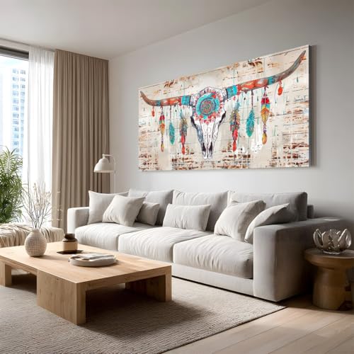 Tableau boho plume et crâne de taureau pour une décoration de salon ethnique chic