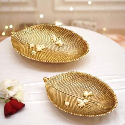 Image of BEHOMA Metal Leaf Shape Tray, 11 & 8 inch, Set of 2 | Set of 2 golden leaf-shape metal trays, 11 inch & 8 inch; perfect for haldi, mehendi & Navratri decor.