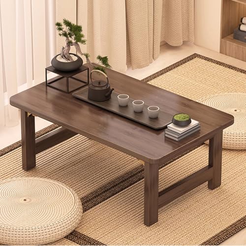 Table basse pliable japonaise pour s'asseoir au sol près d'une fenêtre
