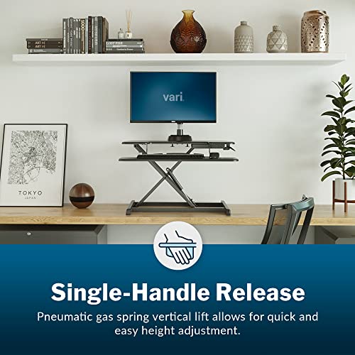 Image of Vari VariDesk Essential Vertical Lift 30 Inch Standing Desk Converter - Compact Home Office Workstation for Laptop or Monitor + Keyboard Tray - Delivers Fully Assembled (Black)