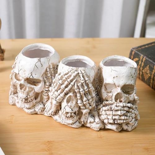 Maceta de resina con cabeza de calavera para solucionar la falta de espacio gótico 5