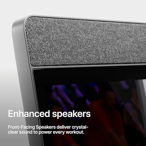 Close-up view of the Peloton Tread’s premium front-facing enhanced speakers with textured fabric grille, delivering immersive crystal-clear audio during workouts