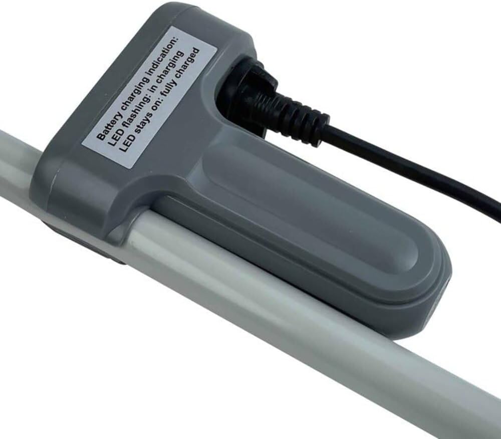 Close-up of the charging indicator lights on the portable shower pump