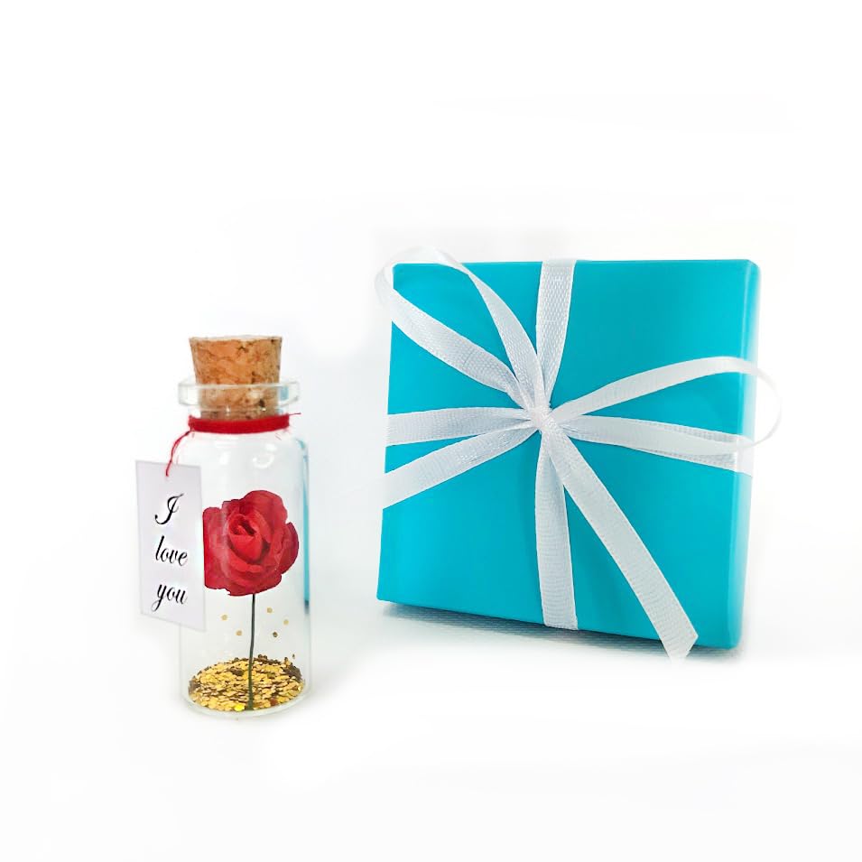 Rose rouge I Love You de luxe Kseniya Revta dans son écrin bleu sarcelle