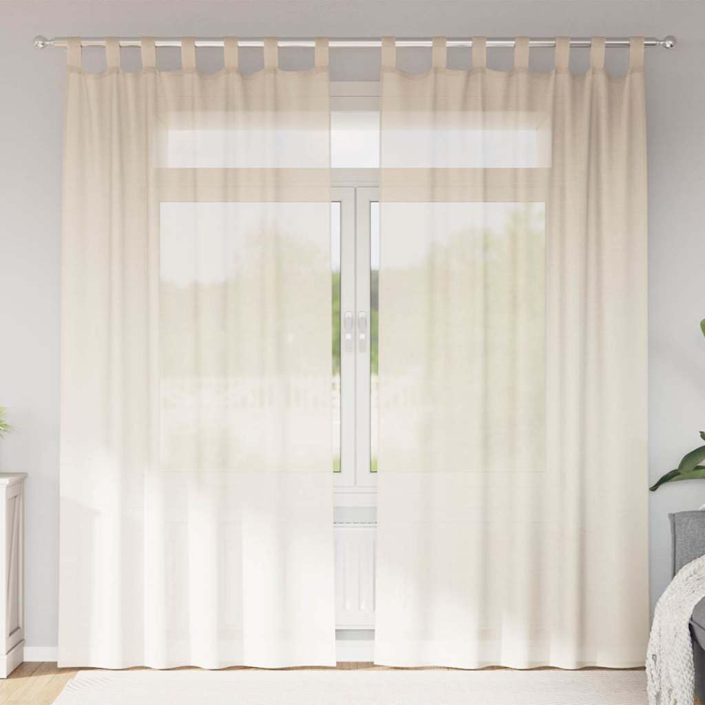 Rideau brise-vue en voile crème pour stopper le vis-à-vis du balcon sans assombrir