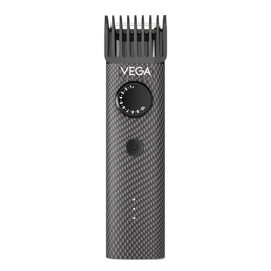 VEGA Men X2 Beard Trimmer (VHTH-17) held in hand, showcasing its ergonomic design and textured body.
