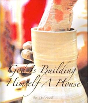 Paperback God is Building Himself a House Book