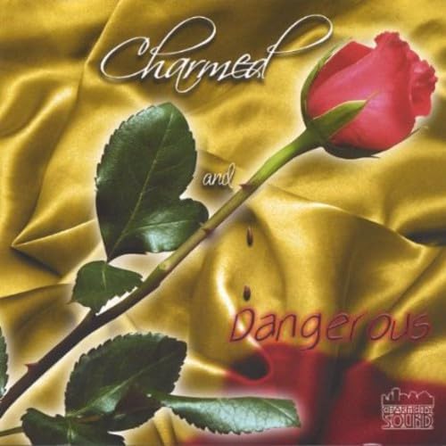 Charmed & Dangerous: Amazon.es: CD y vinilos}