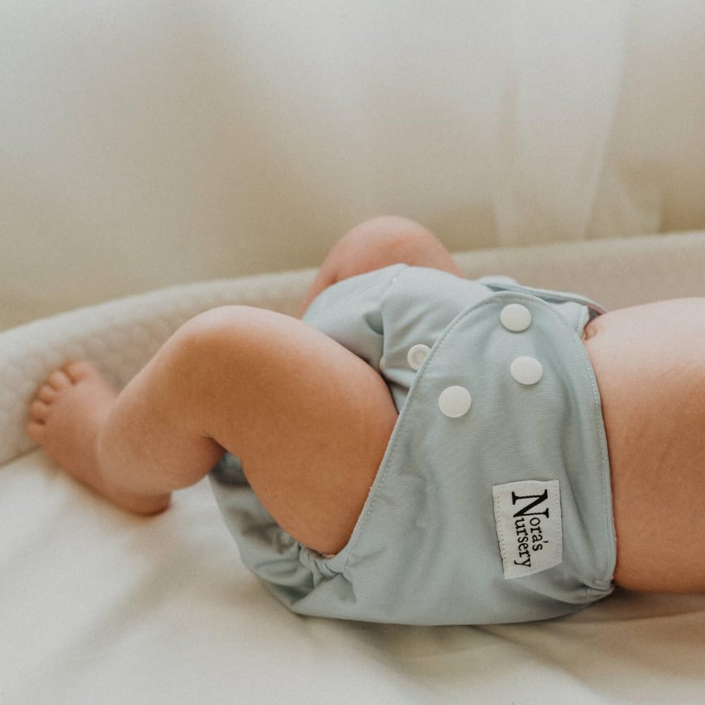 Nora's Nursery Paquete de 7 pañales de tela con 7 insertos y 1 bolsa húmeda, funda impermeable, lavables, reutilizables y pañales de bolsillo ajustables de talla única para recién nacidos y niños
