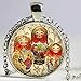 Collier rétro avec pendentif en verre en forme de poupée russe Babouchka rouge ethnique
