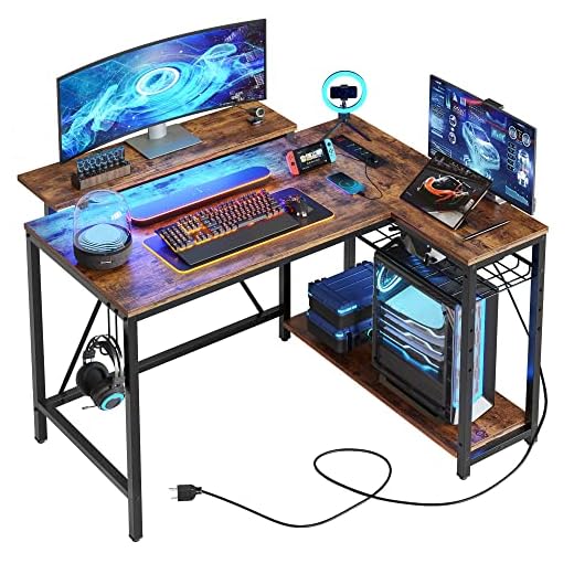 Bestier Small L Shaped Desk with Charging Port & LED Strip,Modern Computer Desk with Reversible Storage Shelves,Corner Desk with Hooks for Bedroom Office Studio Workstation,Rustic Brown