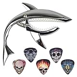 Paquete --- Recibirás 1 cejilla de guitarra de tiburón y 5 púas de guitarra. Los colores de la cejilla son: negro, oro, plata u oro rosa. La selección es un patrón de tema de calavera al azar.