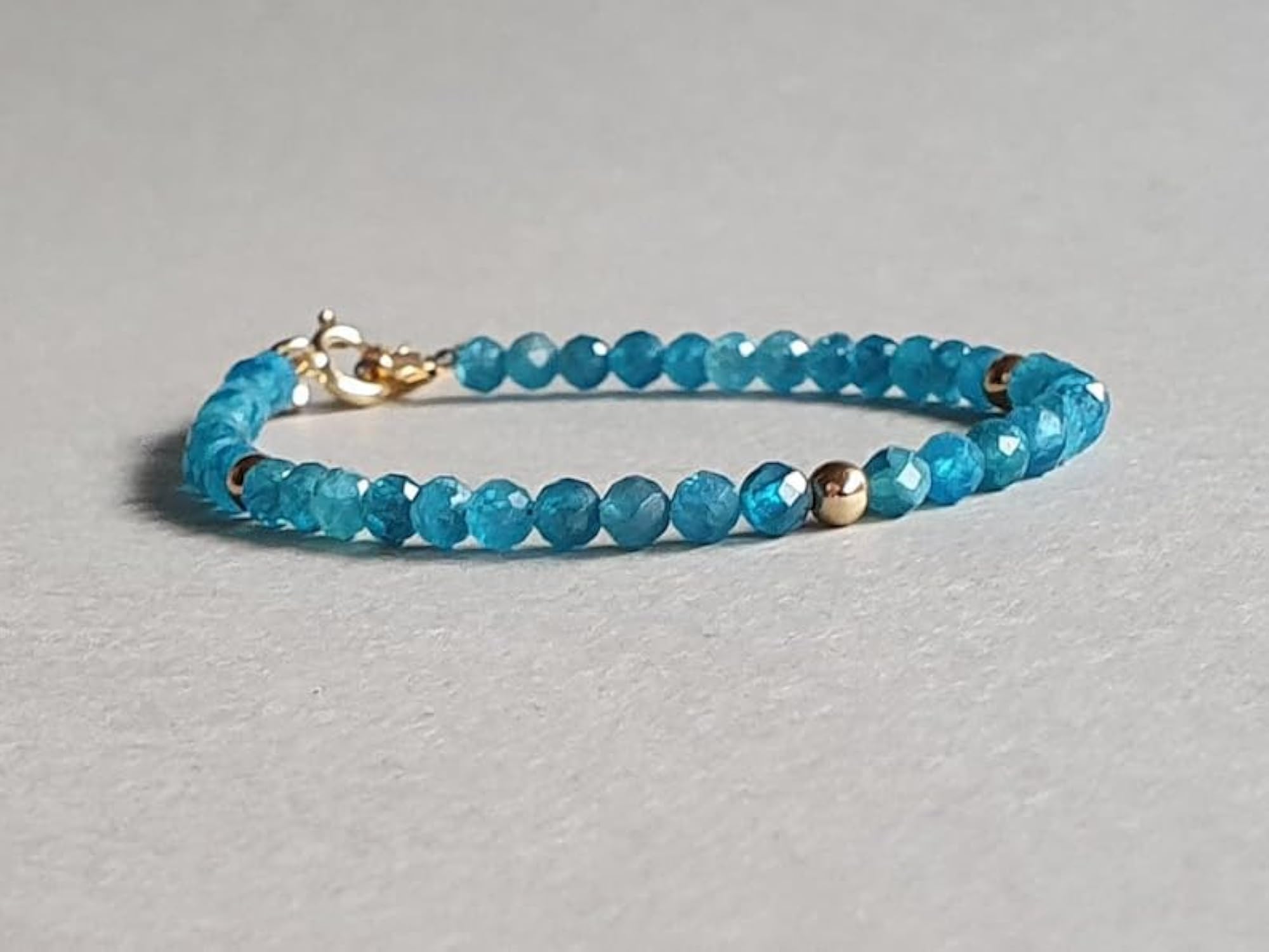 Neon Blue Apatite Round Bead Bracelet, Gold Plated Clasp