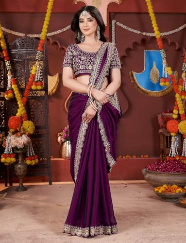 Image of DHARMEE Women's Elegant Designer Sarees Premium Rangoli Fabric with Embellished Border, Lightweight and Stylish Ethnic Wear - Perfect for Parties, Weddings, and Festive Occasions..