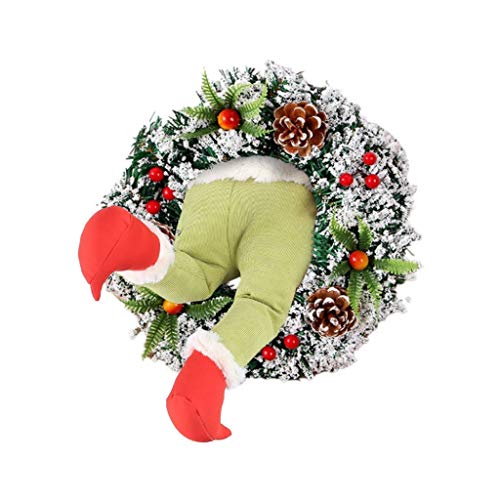 Couronne de noël pour porte d'entrée et ambiance chaleureuse du salon