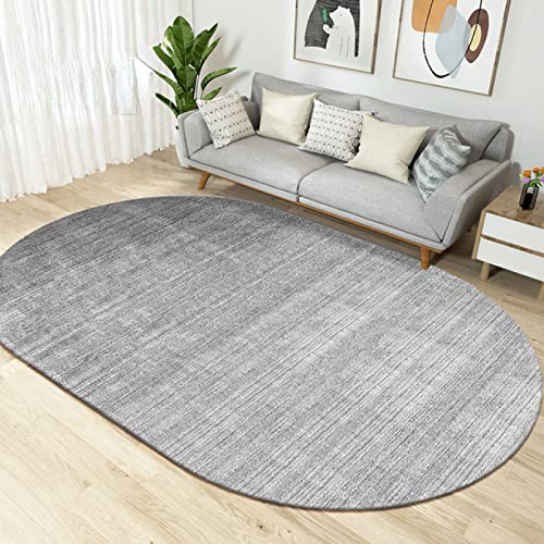 Tapis ovale antidérapant idéal pour réchauffer un salon gris