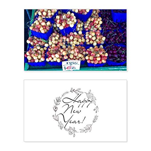 Tarjeta de año nuevo con fotografía de cereza y mensaje de bendición para seres queridos