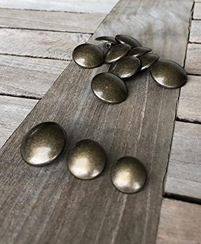 Bottoni in metallo leggermente bombati in ottone