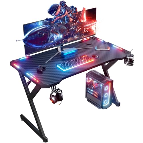 HLONONE LED Mesa Gaming 100 × 55 cm, Escritorio Gamer de Fibra de Carbono Ergonómicas, Escritorio Gaming con Portavasos y Gancho para Auriculares, Negro