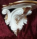 La surface de la console n'est pas tout à fait lisse, voir les photos