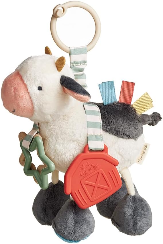Itzy Ritzy Link & Love Toy for Stroller or Car Seat – Features Textured Ribbons, Crinkle Sounds, Clinking Rings & Silicone Teether – Designed for Ages 0 Months and Up (Cow)