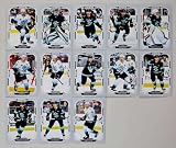 2025-26 O-Pee_Chee Hockey Kraken Team Set of 13 Cards: Eeli Tolvanen,(#4), Tye Kartye,(#48), Philipp Grubauer,(#104), Jamie Oleksiak,(#134), Jaden Schwartz,(#194), Jared McCann,(#204), Shane Wright,(#234), Joey Daccord,(#239), Jordan Eberle,(#299), Brandon Montour,(#364), Vince Dunn,(#404), Matty Beniers,(#449), Chandler Stephenson,(#494) - Sportscard Superstore
