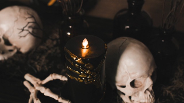 Image of Luminara Skeleton Hands Flameless LED Candle, Black & Gold 3 inch x 6.5 inch, Moving Flame Pillar, Battery Operated Timer Real Wax Halloween Gothic Home Decor