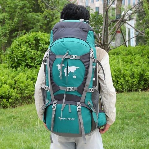 A person wearing a green and grey 75L camping backpack, viewed from the back, demonstrating how the backpack sits on the body.
