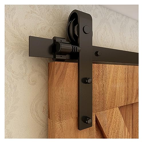 Fini les portes qui claquent : kit quincaillerie pour porte de grange coulissante double stable
