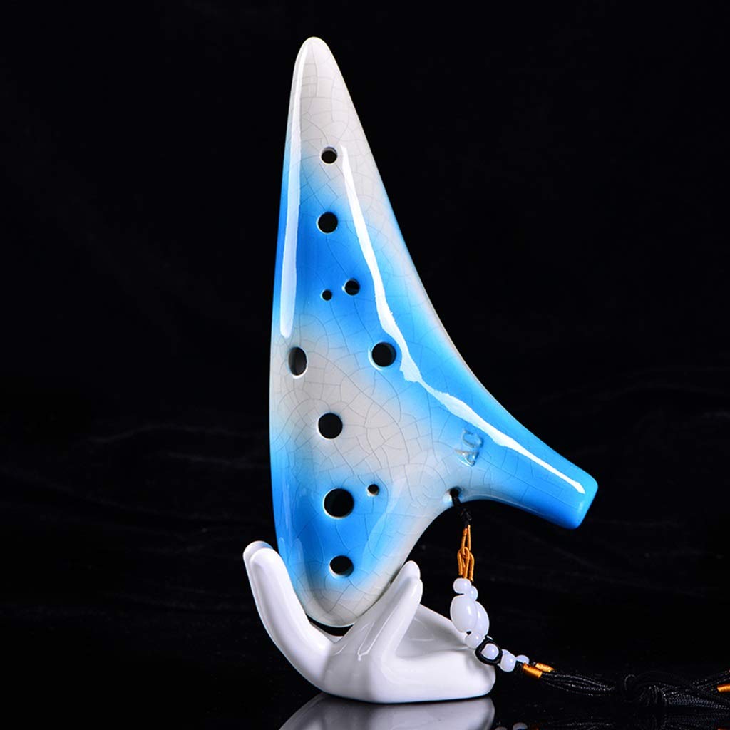 ocarina, Ocarina in argilla contralto Do a 12 fori, sfumata blu e bianca, incrinata