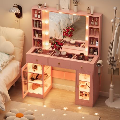 Image of HUANLEGO Pink Vanity Desk with Mirror and Lights, Glass Top Vanity with Lighted Mirror & RGB Glass Cabinet and 3 Drawers, Makeup Vanity Desk with Lights Dressing Table for Bedroom, 3 Color Modes
