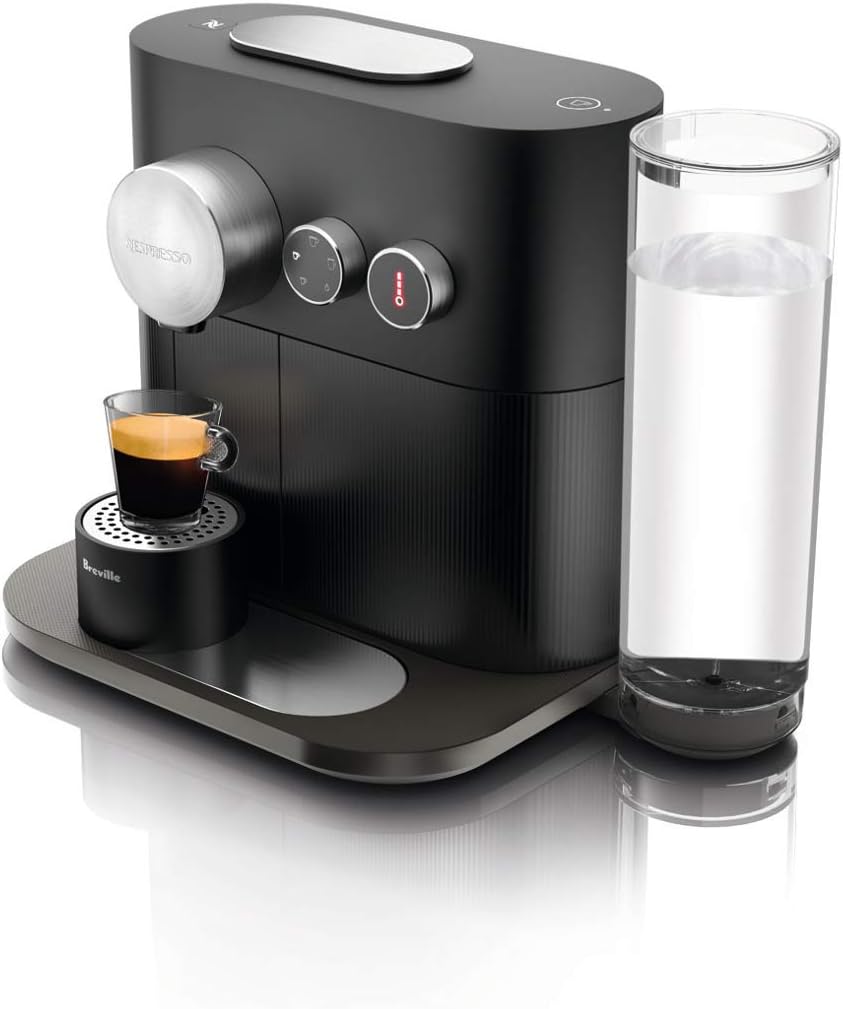 Nespresso Expert Coffee Machine, front view with a cup of espresso