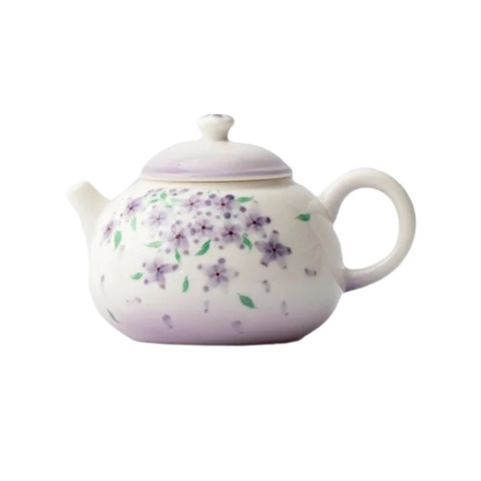 Théière en céramique et fleurs peintes pour votre pause détente et méditation à la maison