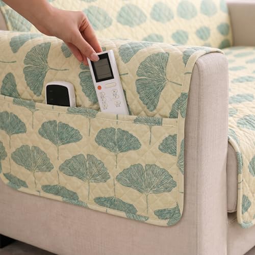 Image of STITCHNEST 'CloudFeel Series' Quilted Printed Velvet Sofa Cover for 1 Seater | Premium Soft Velvet Sofa Protector | Green Leaf Print Design with Armrest Pockets | Furniture Cover