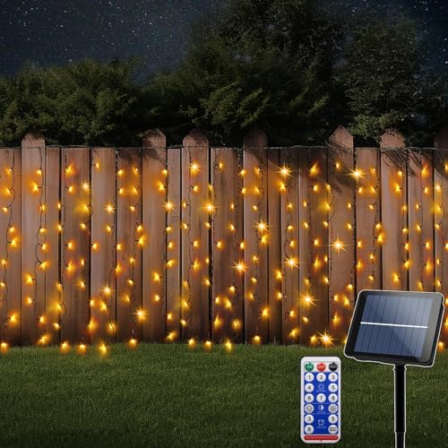 CCILAND Solar Curtain Lights Outdoor 10M x 1M 500 LED Curtain Lights with Remote Control Green Wire Waterfall Fairy String Lights for Garden Patio Fence Gazebo Decor - Warm White