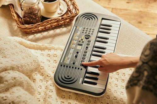 Image of Casio Casiotone SA-51 - 32-Key Mini Keyboard for Kids | Portable Beginner Piano with Built-In Tones, Rhythms & Songs | Battery-Powered, Easy for Small Hands, Ages 5 & Under