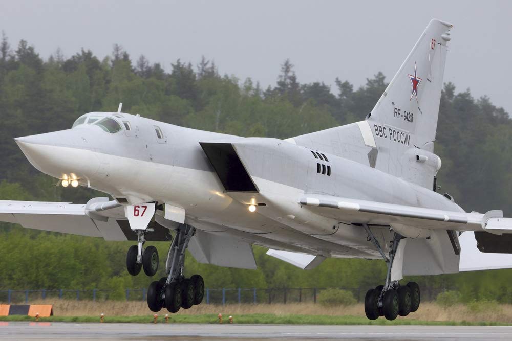 Tu-22M-3 strategic bomber of the Russian Air Force landing. Poster Print by Artem Alexandrovich/Stocktrek Images (17 x 11)