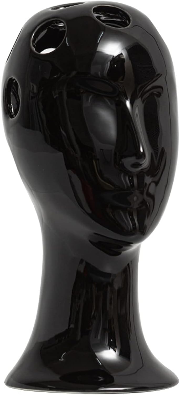 Sculpture de bureau et vase d'art moderne pour rompre la monotonie d'une pièce trop vide
