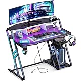 MOTPK Gaming Desk with Power Outlet & LED Lights, Computer Desk 40 Inch with PC Storage Shelf, Gaming Table with Carbon Fiber Texture, Gamer Desk, Gift for Boys Men, Black