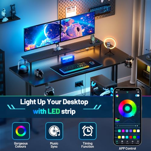 Image of HLDIRECT 55 Inch Gaming Desk with LED Lights & Cable Management, Black | Ergonomic carbon fiber gaming computer desk with 5 sockets, monitor stand, cup holder, headphone hook & mouse pad for gamers